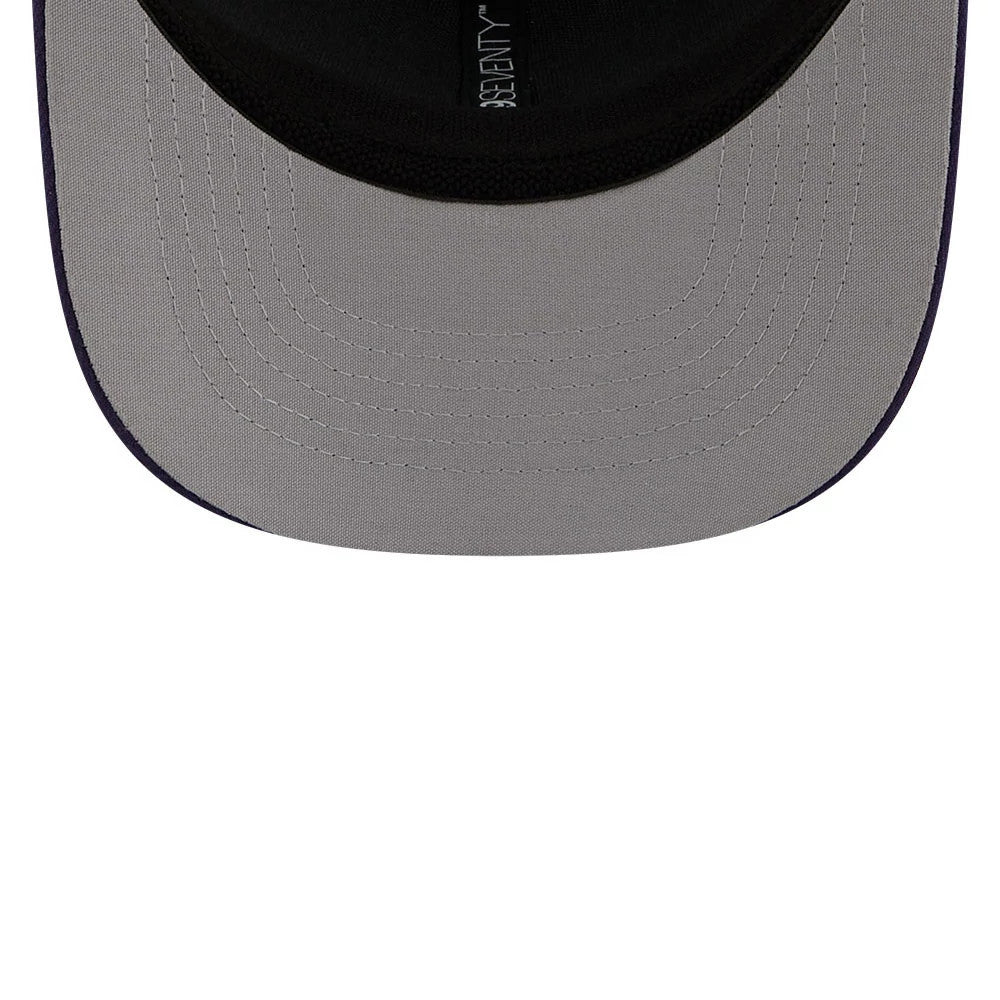 Cyclones MiLB La Copa 2026 Purple New Era 9SEVENTY Stretch Snap Adjustable Cap, inside view showing a grey undervisor with detailed white stitching, a black sweatband, and 9SEVENTY branding in white on the taping against a contrasting backdrop.