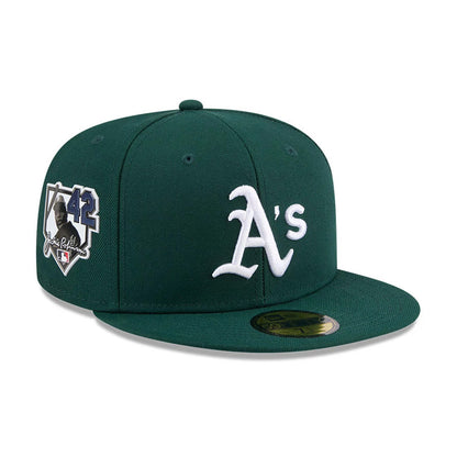 Pictured is this MLB Jackie Robinson Athletics 59FIFTY Fitted cap in dark green. 1