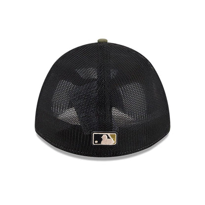 Pictured is this MLB Armed Forces Day 2026 LA Dodgers 39THIRTY M-Crown Stretch Fit cap in green. 6