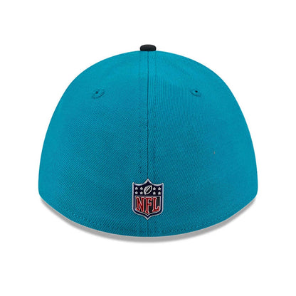 Jaguars NFL Draft 2026 Turquoise New Era 39THIRTY M-Crown Stretch Fit Cap, rear view showing the red, white, and navy embroidered NFL shield logo at the centre of the turquoise back panels, with a black top button and accented eyelets.