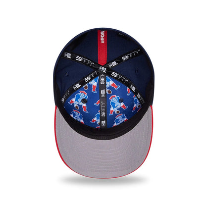 New England Patriots NFL Draft 2026 Dark Blue New Era 59FIFTY Fitted Cap, inside view showing the blue fabric lining with a repeating Pat Patriot graphic, black taping with white 59FIFTY branding, and a grey undervisor edged in red stitching.