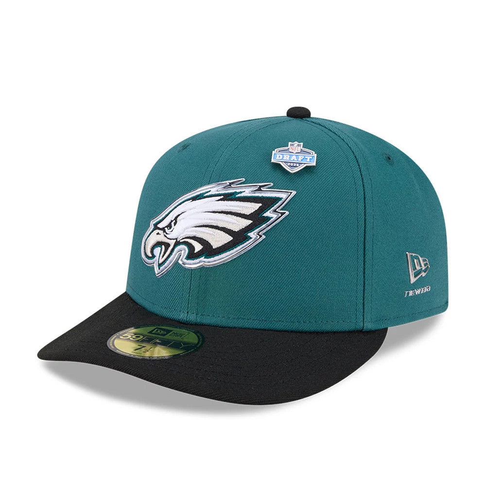 Philadelphia Eagles NFL Draft 2026 Dark Green New Era 59FIFTY Fitted Cap, three-quarter view showing the raised embroidered Eagles logo on the front panel, black flat visor with gold 59FIFTY size sticker.