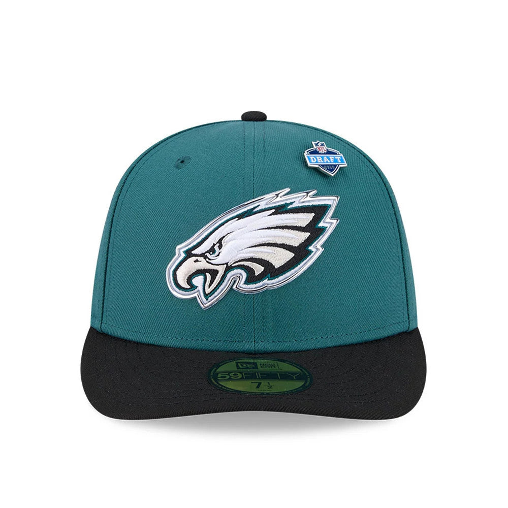 Philadelphia Eagles NFL Draft 2026 Dark Green New Era 59FIFTY Fitted Cap, front view showing the raised white and black embroidered Eagles logo on the green crown, a blue NFL Draft shield pin on the right panel.