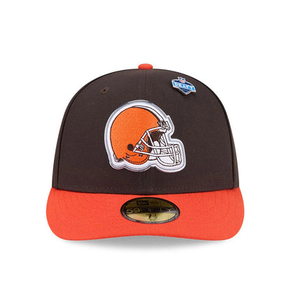 Cleveland Browns NFL Draft 2026 Dark Brown New Era 59FIFTY Fitted Cap, front view showing the raised orange helmet logo on the structured dark brown crown, with a contrasting orange visor and a gold 59FIFTY size sticker on the visor.