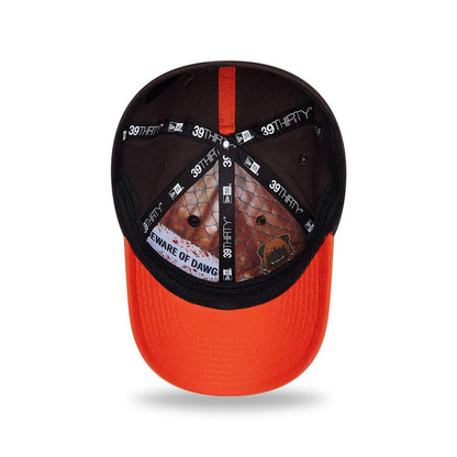 Cleveland Browns NFL Draft 2026 Dark Brown New Era 39THIRTY M-Crown Stretch Fit Cap, inside view showing BEWARE OF DAWG graphic on the sweatband, dark taping with 39THIRTY branding, and an orange undervisor.