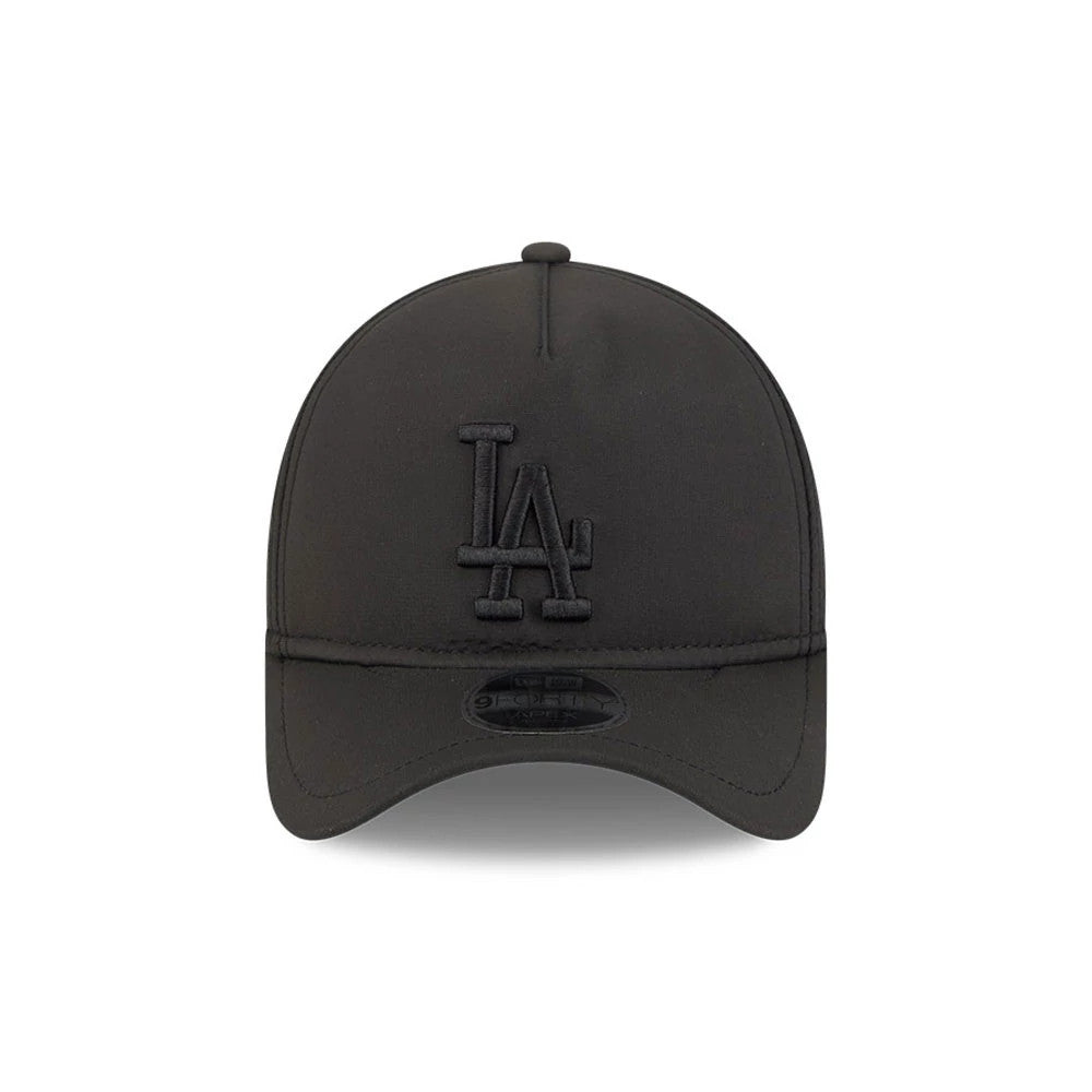 LA Dodgers MLB Quickstrike Black on Black New Era 9FORTY Apex Adjustable Cap, front view showing a black raised embroidered LA logo on the unstructured black crown, a curved black visor, and a 9FORTY size sticker on the visor.