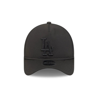 LA Dodgers MLB Quickstrike Black on Black New Era 9FORTY Apex Adjustable Cap, front view showing a black raised embroidered LA logo on the unstructured black crown, a curved black visor, and a 9FORTY size sticker on the visor.
