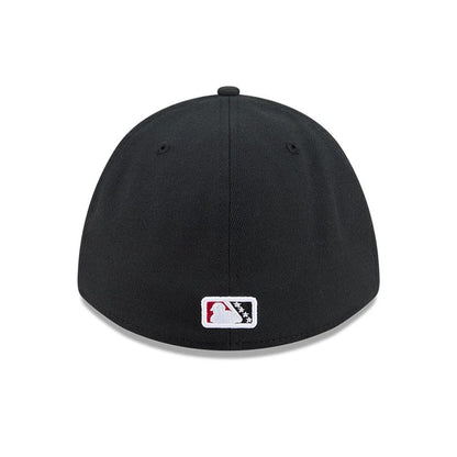 Pictured is this MiLB On Field Player Replica Lake Elsinore Storm 39THIRTY M-Crown Stretch Fit cap in Black. 7