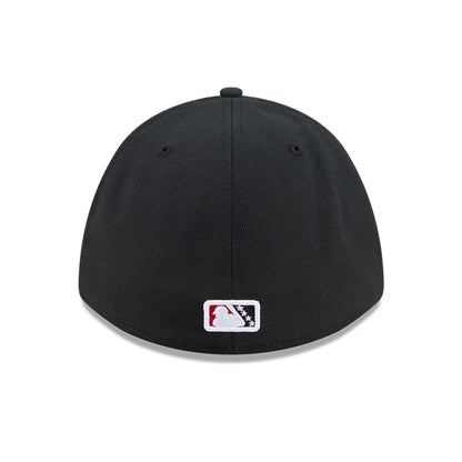Pictured is this MiLB On Field Player Replica Lake Elsinore Storm 39THIRTY M-Crown Stretch Fit cap in Black. 7