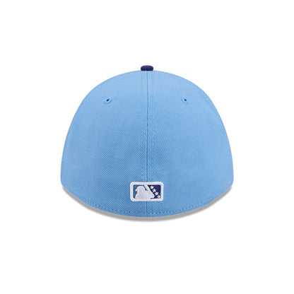 Pictured is this MiLB On Field Player Replica Buffalo Bisons 39THIRTY M-Crown Stretch Fit cap in blue. 6