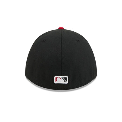Pictured is this MiLB On Field Player Replica Lake Elsinore Storm 39THIRTY M-Crown Stretch Fit cap in Black. 7