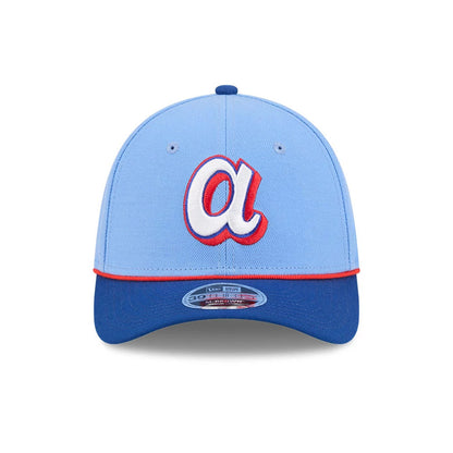 Atlanta Braves MLB City Connect Blue New Era 39THIRTY M-Crown Stretch Fit Cap, front view showing the white and red embroidered a logo on the light blue crown, with a contrasting dark blue visor and red trim along the edge.