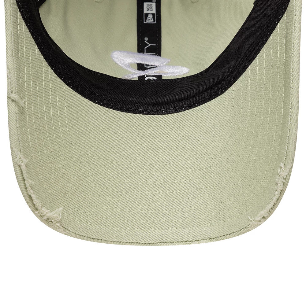 Pictured is this Quadrant X New Era Distressed 9TWENTY cap in pastel green. 7