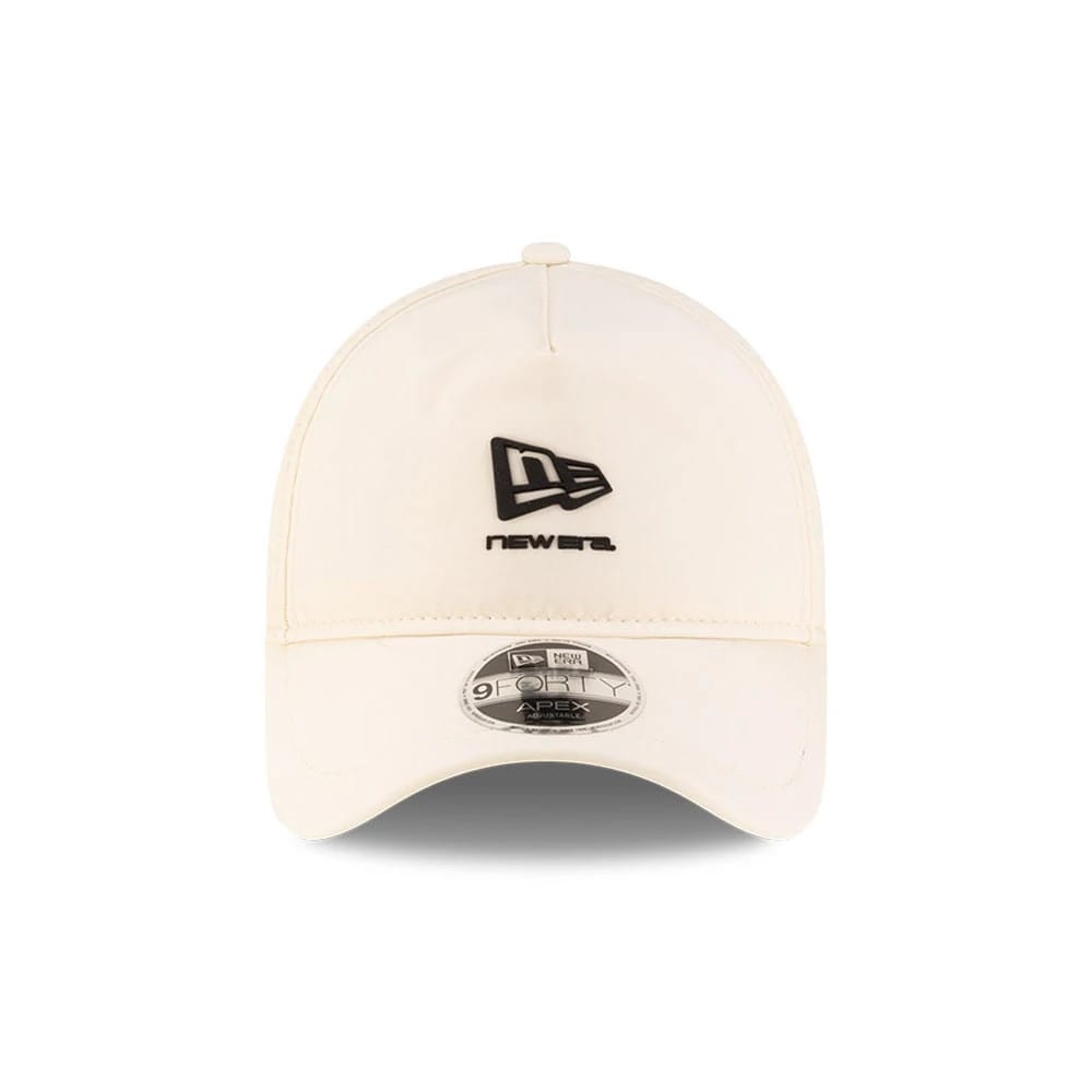 Pictured is this New Era 9FORTY Apex cap in light beige. 3
