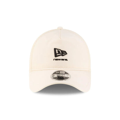 Pictured is this New Era 9FORTY Apex cap in light beige. 3