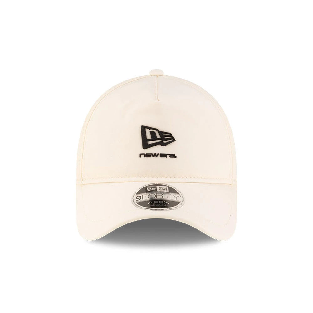 Pictured is this New Era 9FORTY Apex cap in light beige. 3