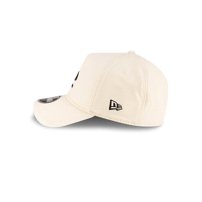 Pictured is this New Era 9FORTY Apex cap in light beige. 6
