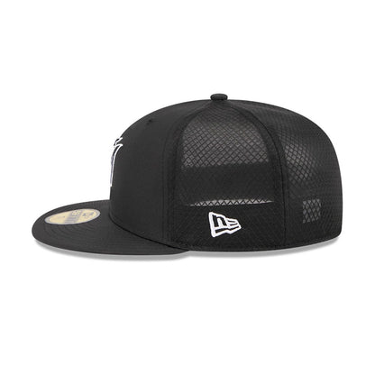 Miami Marlins MLB Batting Practice 2026 Black New Era 59FIFTY Fitted Cap, side view showing the white New Era flag logo on the black diamond-patterned mesh panels, with a flat black visor and gold 59FIFTY size sticker on the visor.