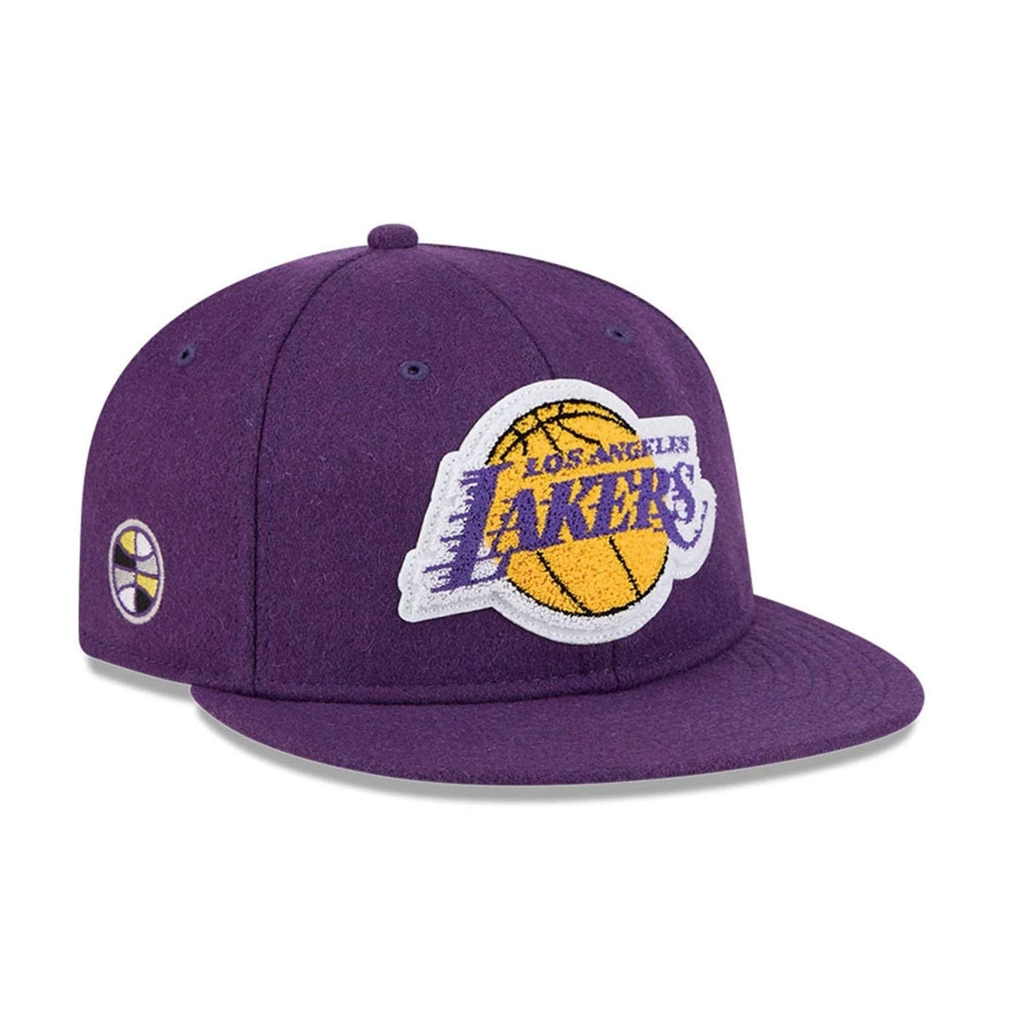 Pictured is this NBA Chenille Woven LA Lakers Retro Crown 9FIFTY cap in purple. 1