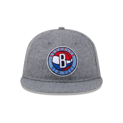 Pictured is this NBA Chenille Woven Brooklyn Nets Retro Crown 9FIFTY cap in grey. 4