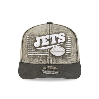Pictured is this NFL Washed Denim New York Jets 9SEVENTY Stretch Snap cap in dark grey. 2