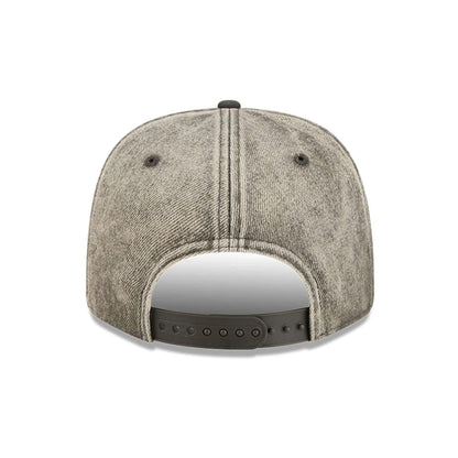 Pictured is this NFL Washed Denim New York Jets 9SEVENTY Stretch Snap cap in dark grey. 6