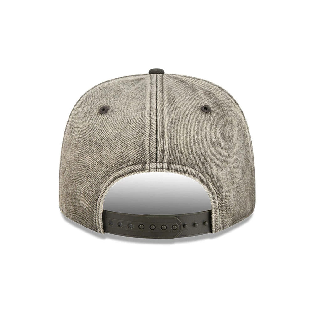 Pictured is this NFL Washed Denim New York Jets 9SEVENTY Stretch Snap cap in dark grey. 6