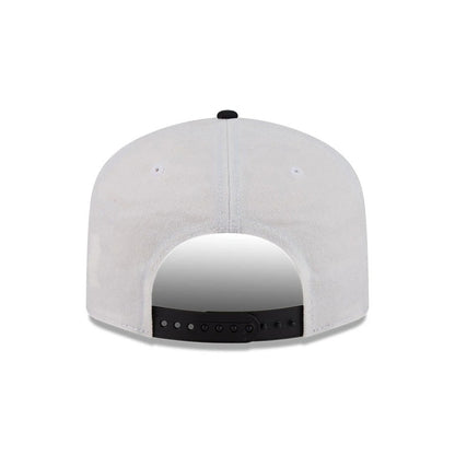 Las Vegas Raiders NFL Duck Cloth White New Era 19TWENTY Adjustable Cap, rear view showing the black adjustable snap closure, soft white duck cloth fabric on the back panels, and a black top button contrasting against the structured design.