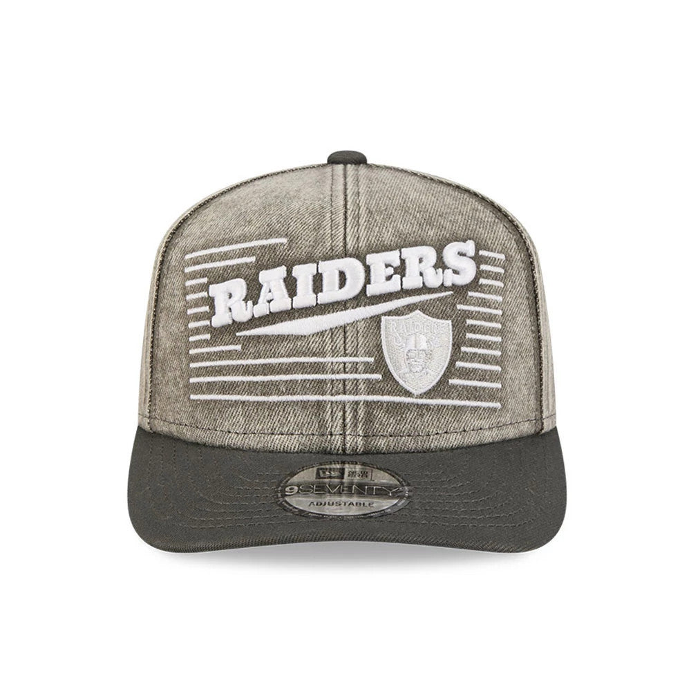 Las Vegas Raiders NFL Washed Denim Dark Grey New Era 9SEVENTY Stretch Snap Cap, front view showing the white embroidered 'RAIDERS' text on the grey denim front panel, a matching team shield logo, and a 9SEVENTY size sticker on the dark grey visor.