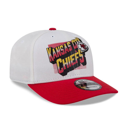 Kansas City Chiefs NFL Duck Cloth White New Era 9SEVENTY Stretch Snap Cap, front view showing raised Kansas City Chiefs text in red and yellow on the front panel, a red visor with a 9SEVENTY size sticker, and a red top button.