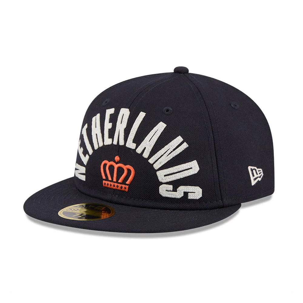 Pictured is this WBC Classical Script Netherlands Retro Crown 59FIFTY Fitted cap in Navy. 4