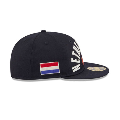 Pictured is this WBC Classical Script Netherlands Retro Crown 59FIFTY Fitted cap in Navy. 5