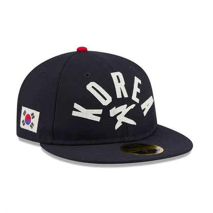 Pictured is this WBC Classical Script Korea Retro Crown 59FIFTY Fitted cap in blue. 1