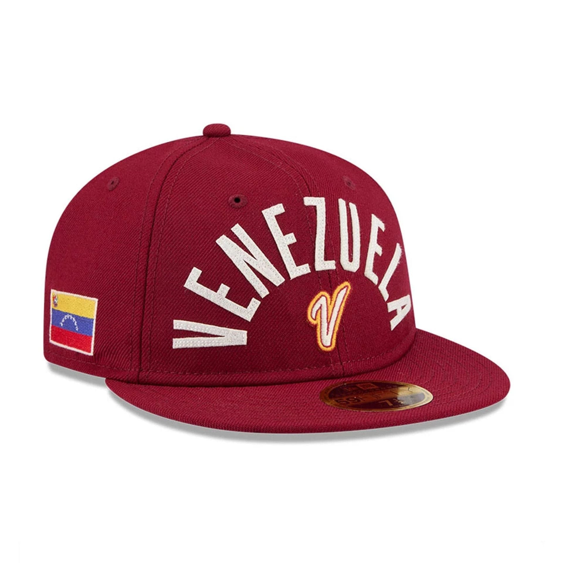 Pictured is this WBC Classical Script Venezuela Retro Crown 59FIFTY Fitted cap in dark red. 1