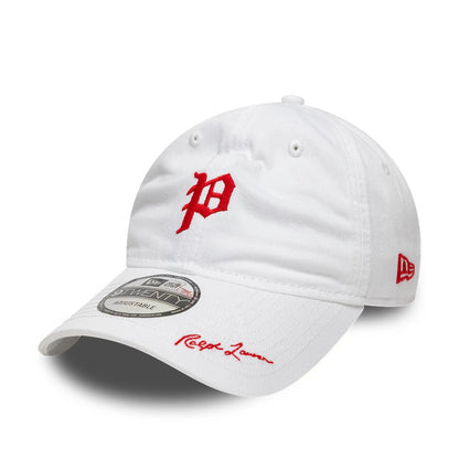 Philadelphia Phillies Ralph Lauren X MLB White New Era 9TWENTY Adjustable Cap, three-quarter view showing the red embroidered P logo on the front panel, curved white visor with Ralph Lauren signature in red, and New Era flag logo on the left side.