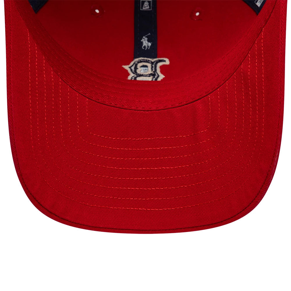 Boston Red Sox Ralph Lauren X MLB Red New Era 9TWENTY Adjustable Cap, inside view showing a red undervisor with a blue sweatband featuring the Ralph Lauren Polo Pony logo and taping with repeat New Era branding.