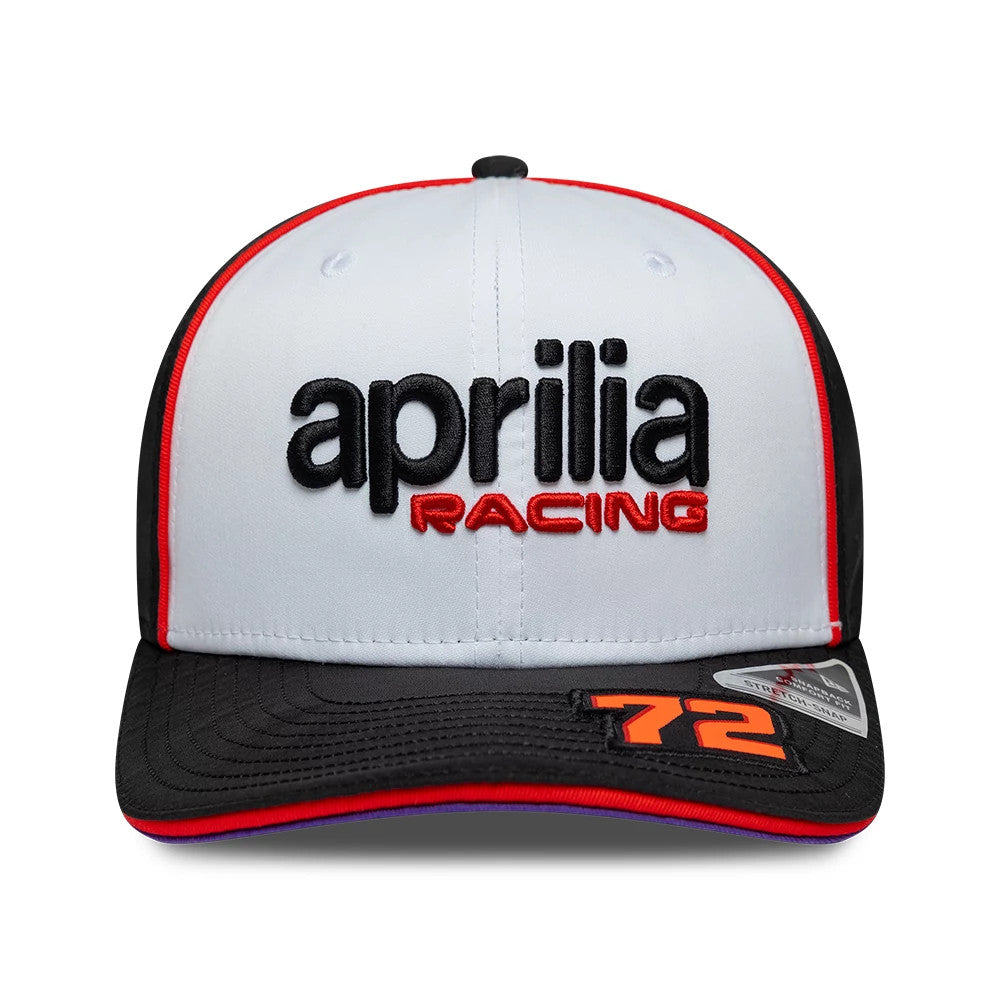 Aprilia Replica Marco Bezzecchi White New Era 9SEVENTY Stretch Snap Adjustable Cap, front view showing the black and red embroidered aprilia racing logo on the white crown, with a black visor and a 9SEVENTY size sticker.