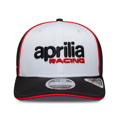 Pictured is this Aprilia Team 9SEVENTY Stretch Snap cap in white. 4