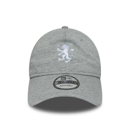 Aston Villa FC Jersey Grey New Era 9TWENTY Adjustable Cap, front view showing a white embroidered lion crest on the front panel, a curved grey visor, and the 9TWENTY size sticker on the top of the visor.