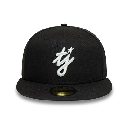 Pictured is this Twojeys X New Era 59FIFTY Fitted cap in black. 3