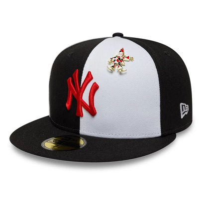 Pictured is this MLB Pinwheel New York Yankees 59FIFTY Fitted cap in black. 1