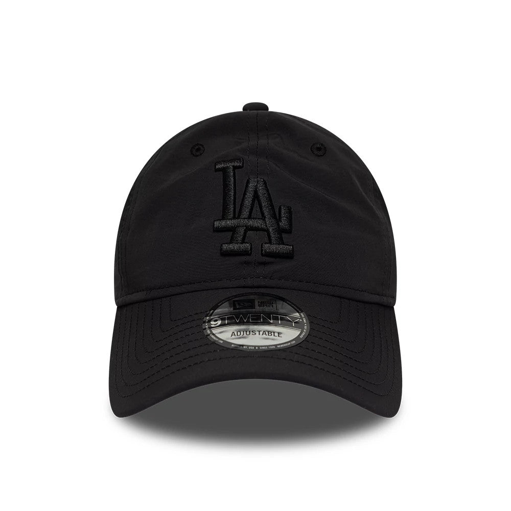 LA Dodgers MLB Recycled Black On Black New Era 9TWENTY Adjustable Cap, front view showing a raised black embroidered LA logo on the structured crown, curved black visor and a 9TWENTY size sticker on the centre of the visor.