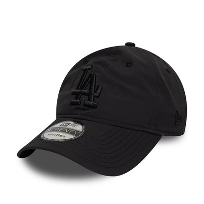 LA Dodgers MLB Recycled Black On Black New Era 9TWENTY Adjustable Cap, front view showing the raised black LA logo embroidered on the front panel, curved black visor with a 9TWENTY size sticker, and black New Era flag logo on the left side.