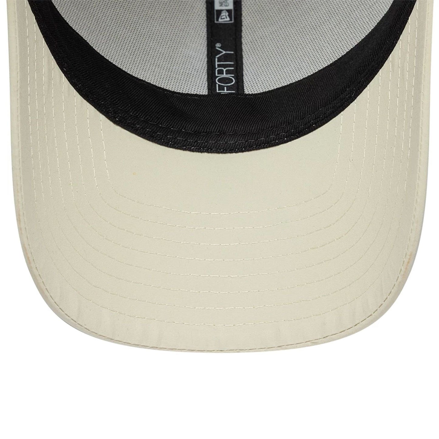 Pictured is this New Era Mini Logo Recycled 9FORTY cap in light beige. 7