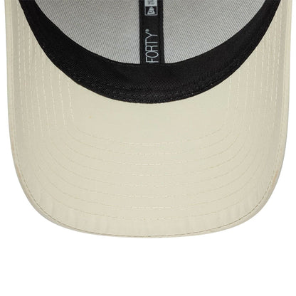 Pictured is this New Era Mini Logo Recycled 9FORTY cap in light beige. 7