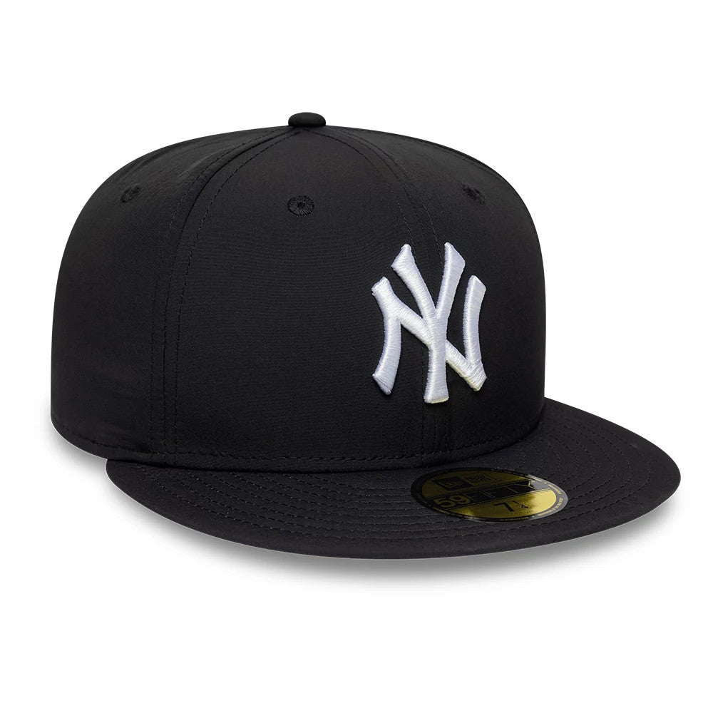New York Yankees MLB Recycled Black New Era 59FIFTY Fitted Cap, front view showing the raised white embroidered NY logo on the structured black crown, with a matching black flat visor and a gold 59FIFTY size sticker.