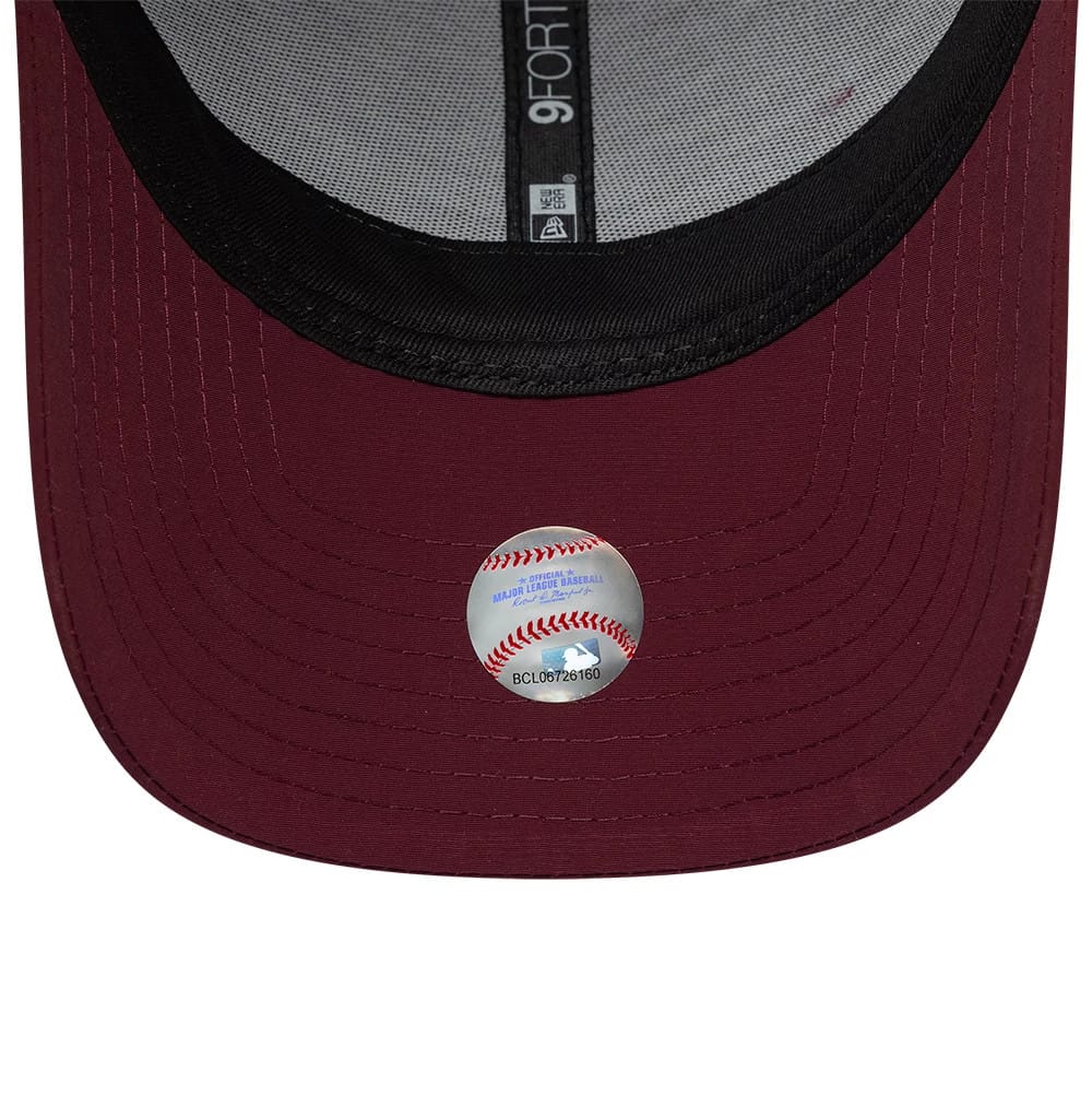 Pictured is this New Era Mini Logo Recycled 9FORTY cap in dark red. 7