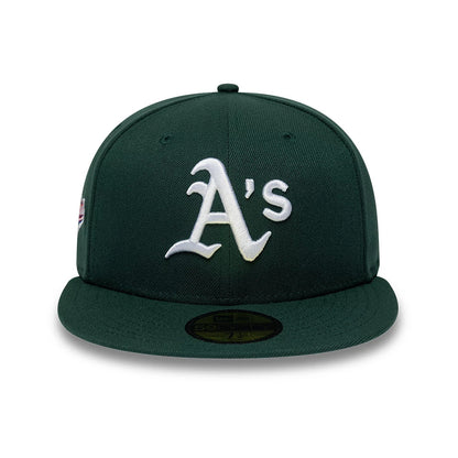 Pictured is this MLB Sidepatch Athletics 59FIFTY Fitted cap in dark green. 3