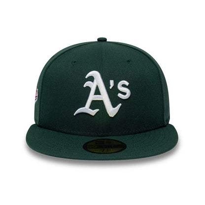 Pictured is this MLB Sidepatch Athletics 59FIFTY Fitted cap in dark green. 3