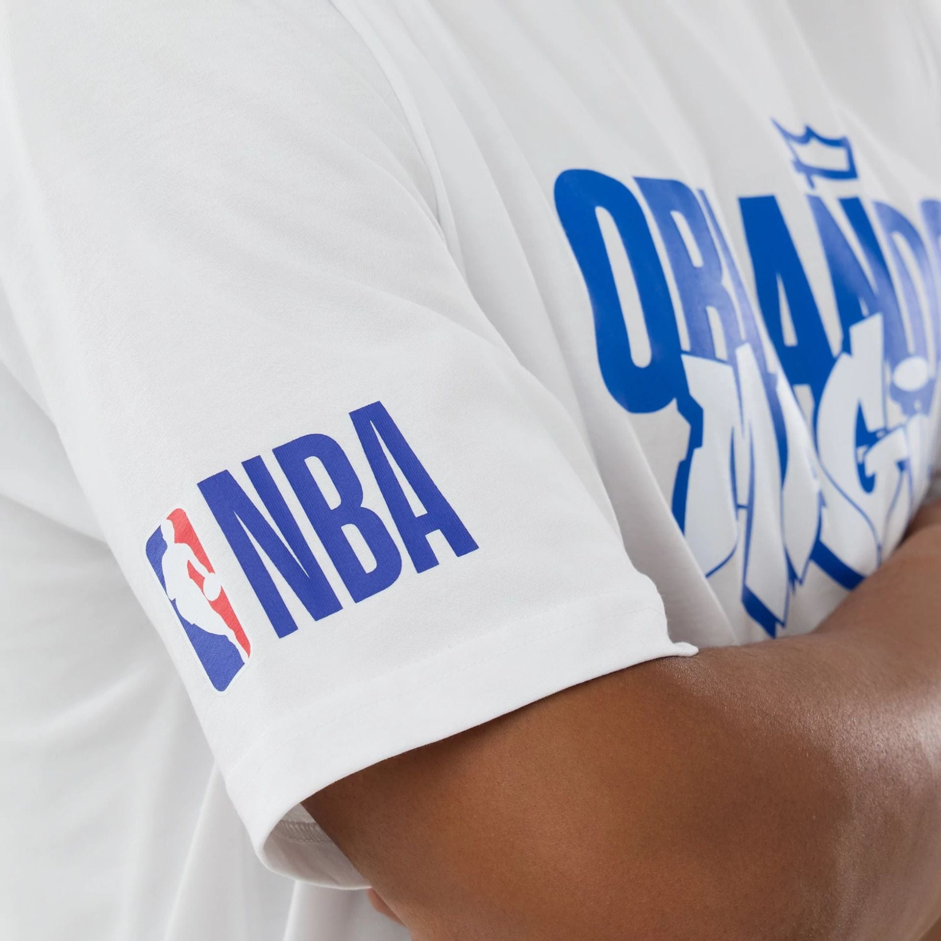 The model is wearing this NBA Berlin Game 2026 Orlando Magic Oversized T-Shirt in white. 3